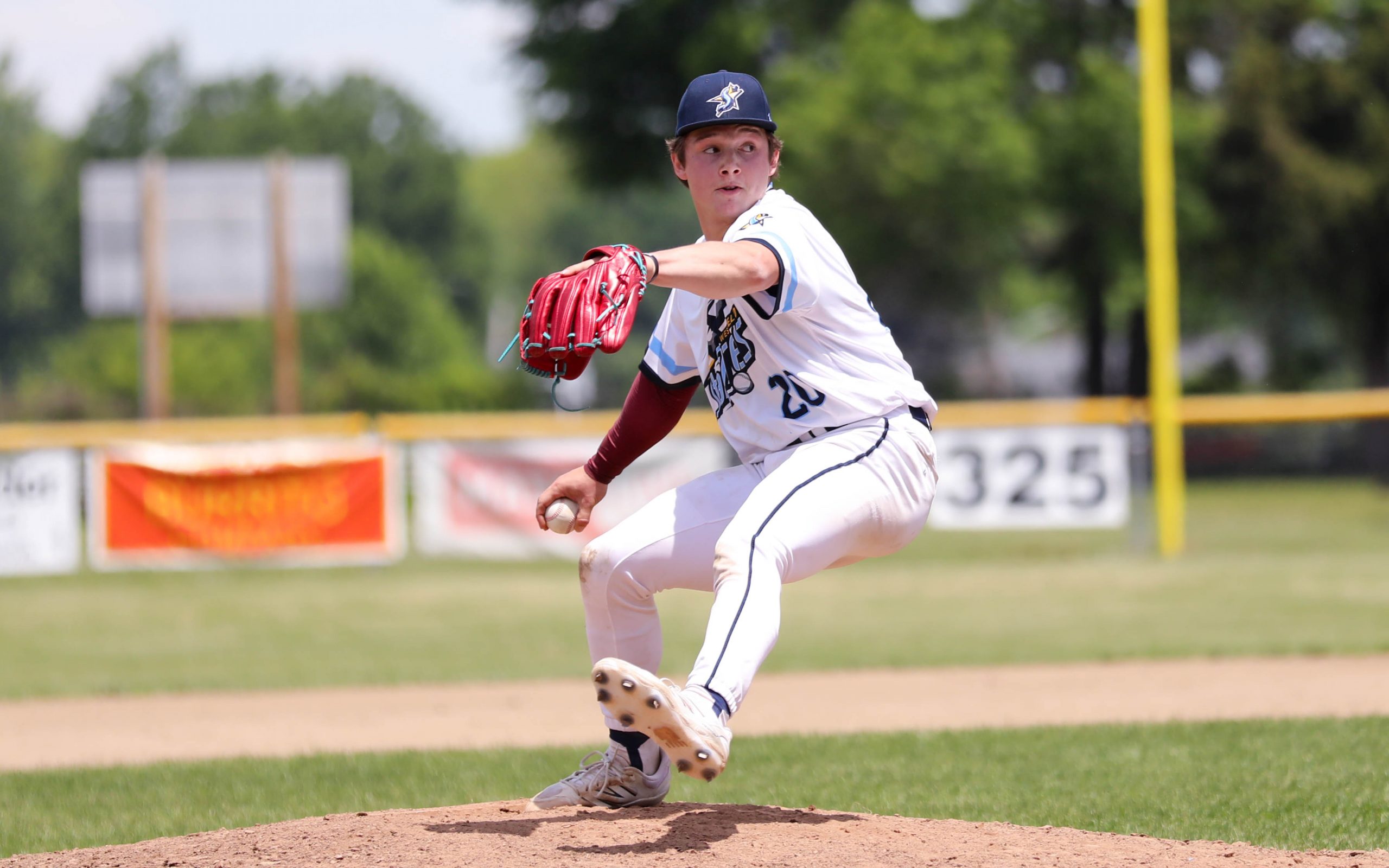 John Mass pitches for the Starfires at Bullens Field