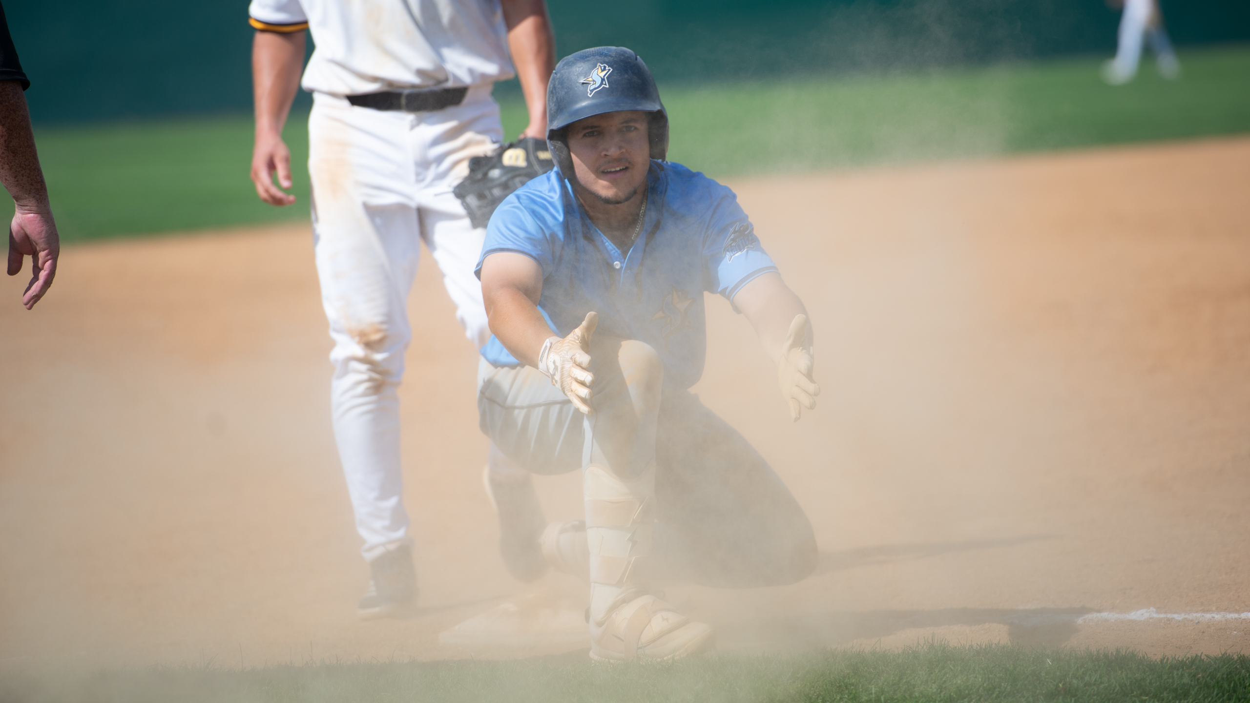 Chatfield in the dust safe at third at New Britain