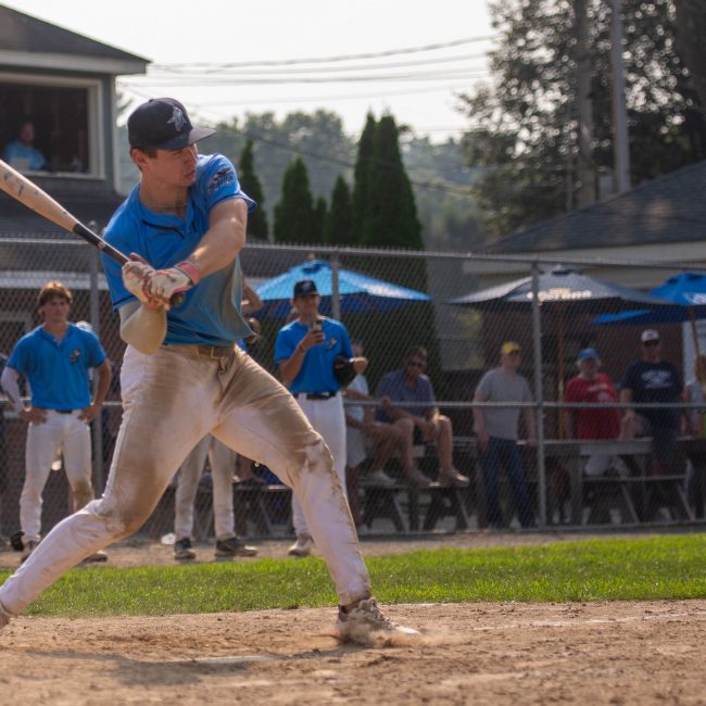 Griffin Enis, just before he hits a baseball approximately six miles